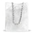 White perforated handbag with a chain handle on a white background